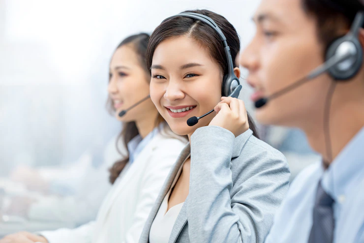 smiling beautiful asian woman working call center office 8087 3660 1